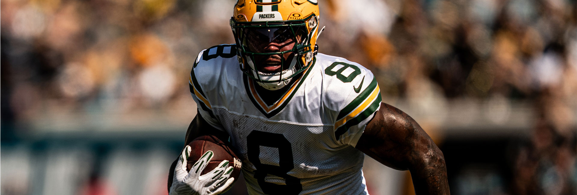 Josh Jacobs running ball for Green Bay Packers